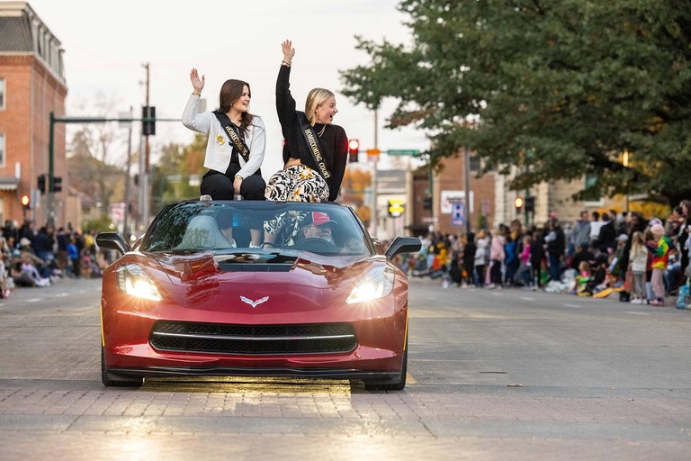 Students, staff, faculty, and members of the Iowa City and surrounding communities participate in and watch the 2024 Homecoming Parade